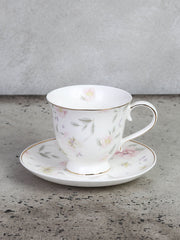 Kop og tallerken med blomstermotiv og guld kant by C&E