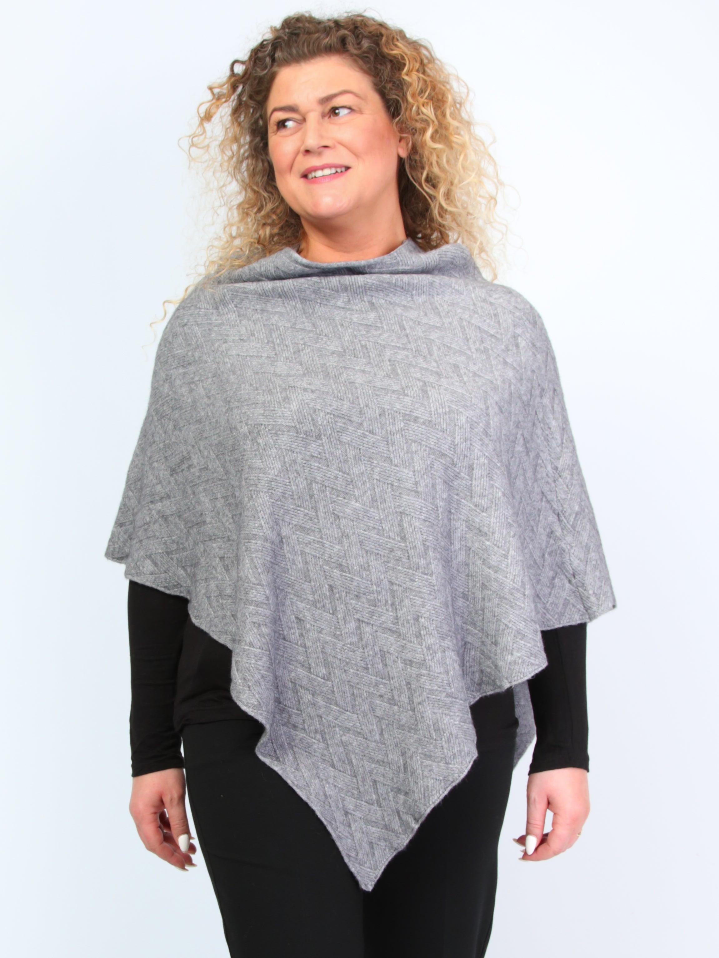 Krone 1 knitted poncho with zigzag