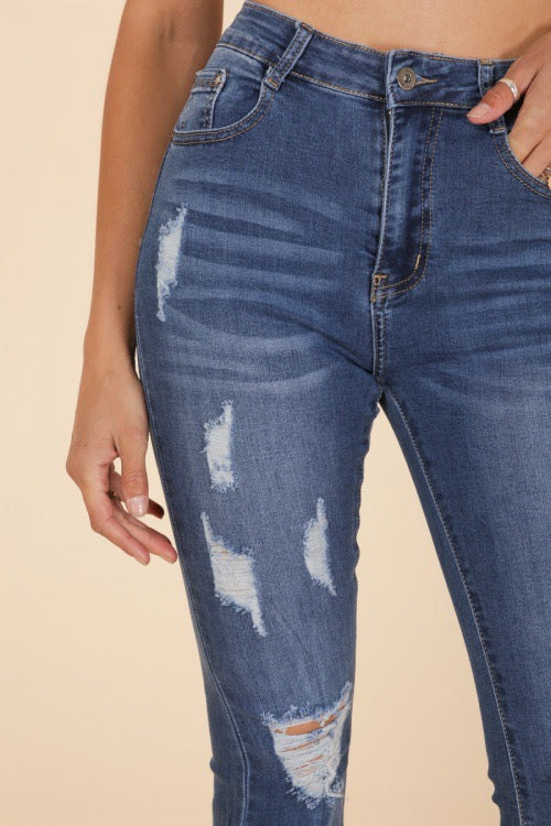 Jeans with width and holes