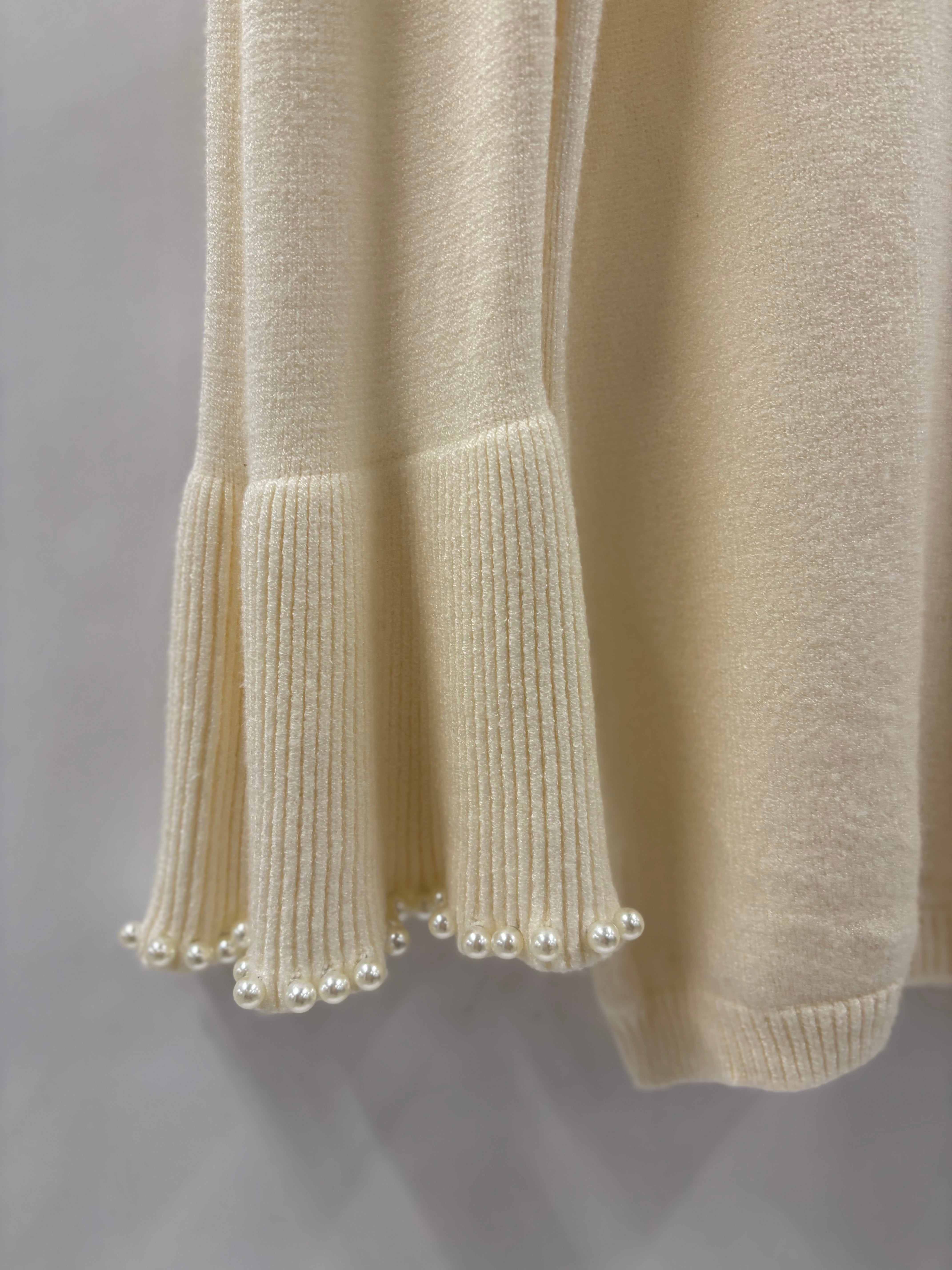 Strikbluse, Perlekant