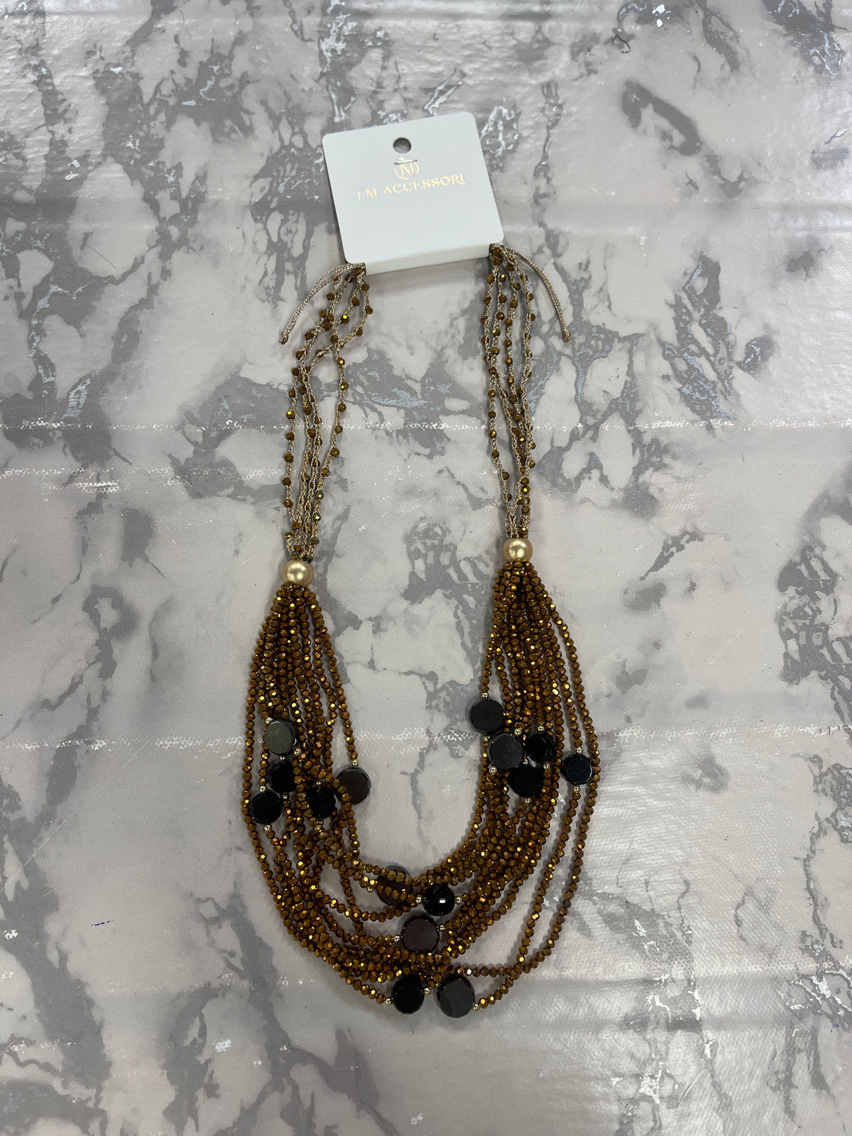 Bronzefarvet glitrende perlehalskæde