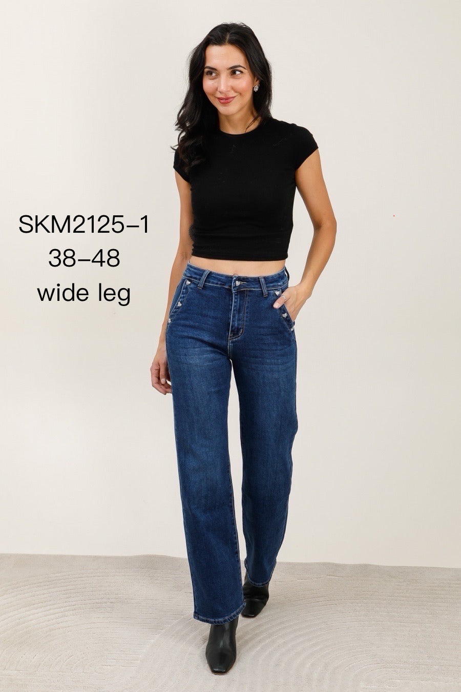 Jeans med vidde og bling hjerter ved lomme
