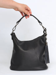 Leather bag with strap