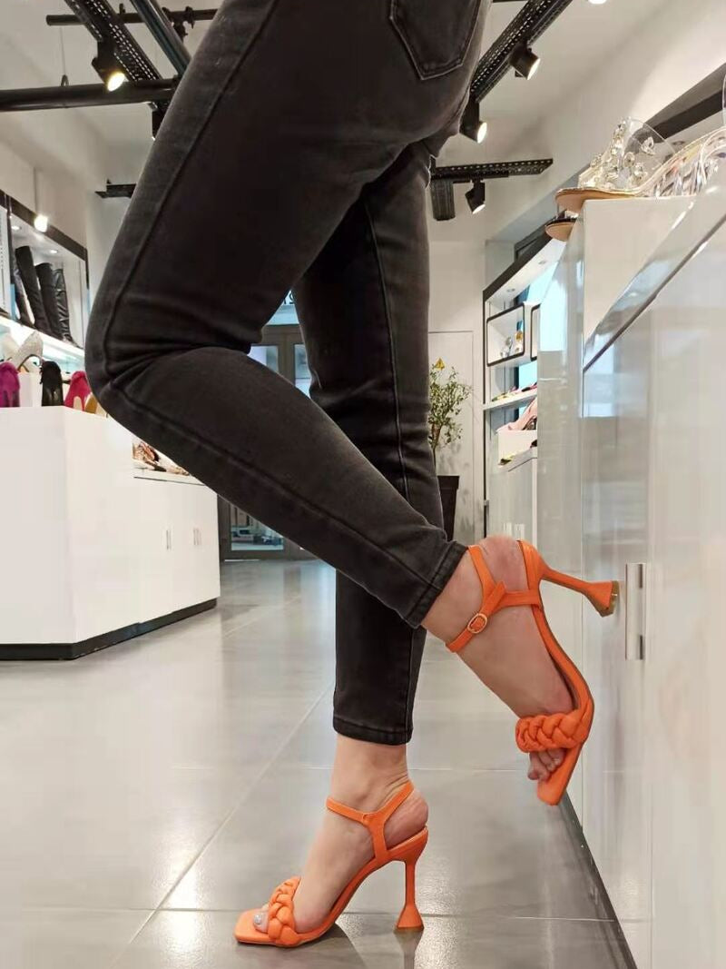 High sandals with unique heel orange