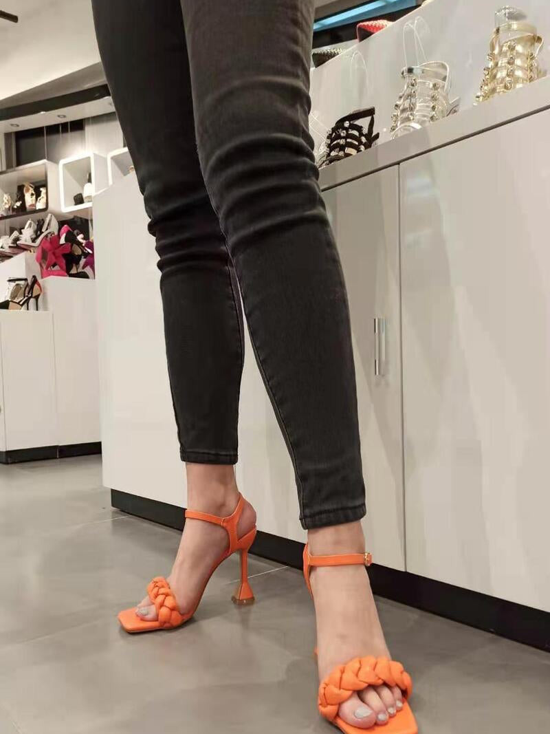 High sandals with unique heel orange