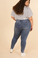 Plus size jeans with fringe detail at the bottom