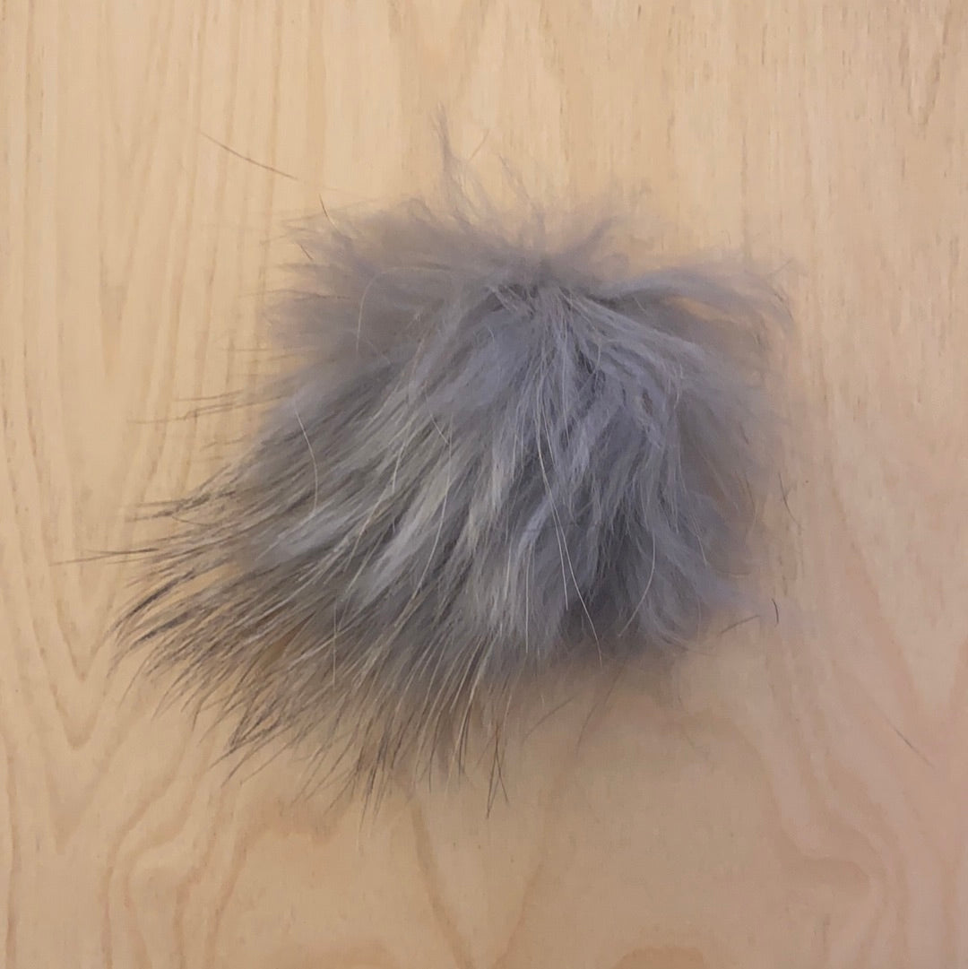 Fur balls to attach to clothes