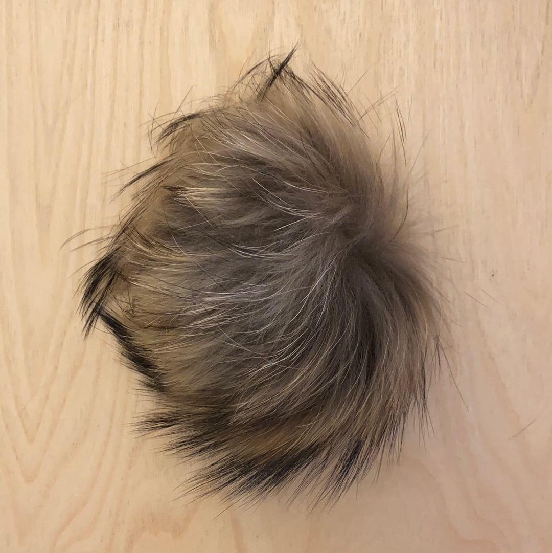 Fur balls to attach to clothes