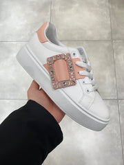 Sneakers with bling brooch