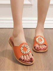Sandal with gold wreath