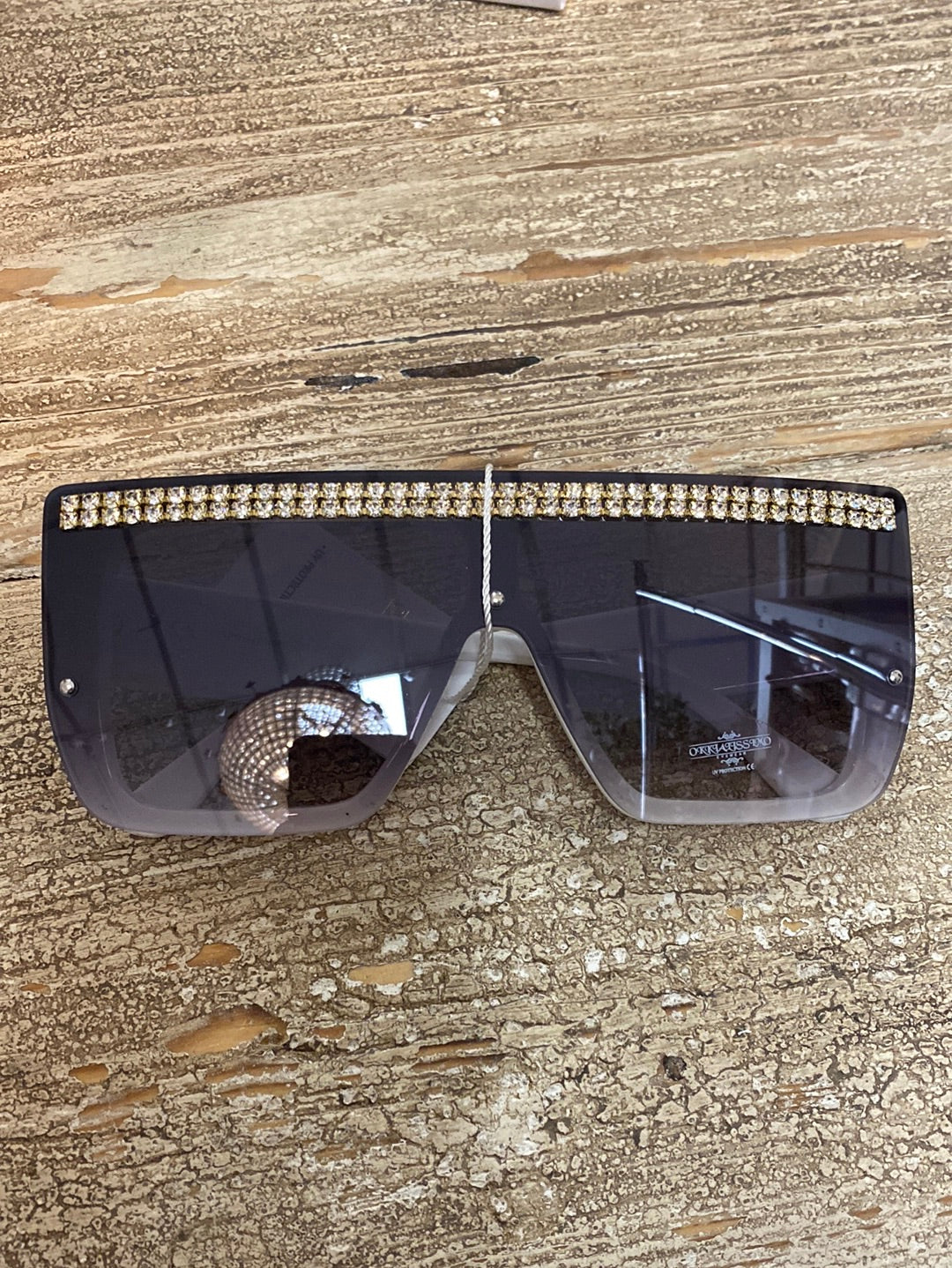 Sunglasses with bling stripe at the top