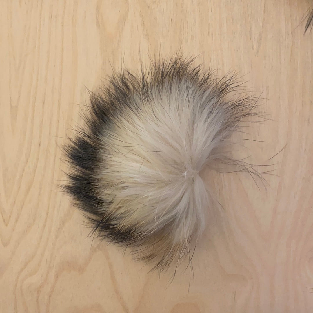 Fur balls to attach to clothes